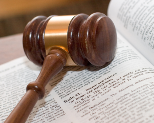 A gavel on a dictionary.
