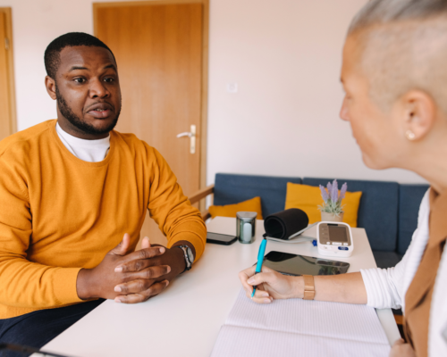 A man having a meeting with a consular.